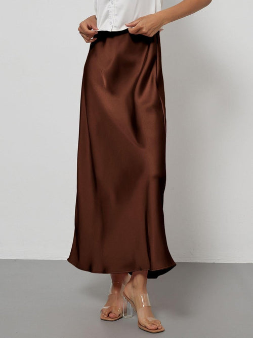 European American style satin midi skirt by Mandotos International, shown in a sleek, flowing design suitable for stylish wear.