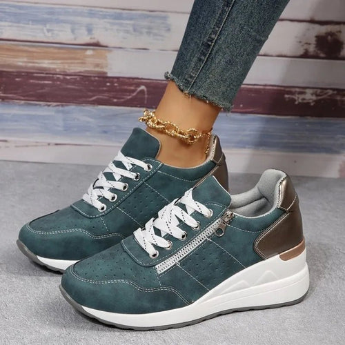 Fashionable lace-up sneakers with zipper detail and medium heel height by MANDOTOS INTERNATIONAL, displayed on a clean background.