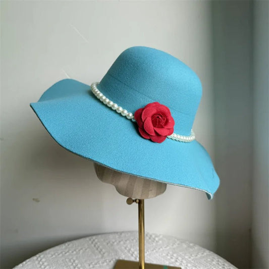 Women's French style fedora hat by MANDOTOS INTERNATIONAL with wide brim felt design, suitable for winter and autumn jazz or derby fashion.