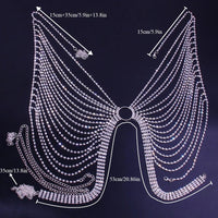 Geometric bikini chest chain by MANDOTOS INTERNATIONAL with crystal and rhinestone accents, featuring intricate metal design.