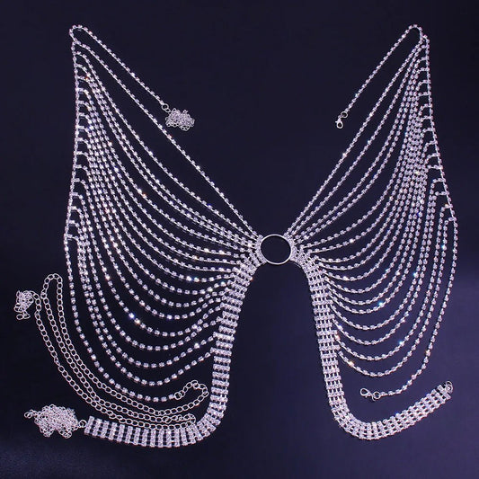 Mandotos International geometric bikini chest chain with crystal and rhinestone accents, featuring intricate metalwork and sparkling details.