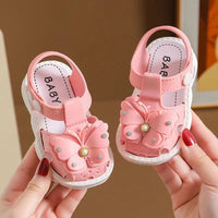Girls' summer sandals by MANDOTOS INTERNATIONAL, soft sole, non-slip infant beach shoes for little girls with princess design.