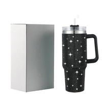40oz glitter-coated stainless steel tumbler with diamond design by MANDOTOS INTERNATIONAL, featuring a shiny, textured surface and durable build.