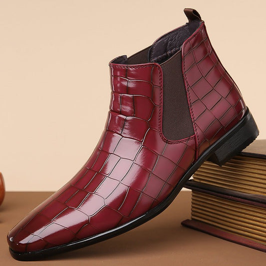 Glossy black high-top men's Chelsea boots in size 48 by MANDOTOS INTERNATIONAL, featuring sleek leather design and elastic side panels.