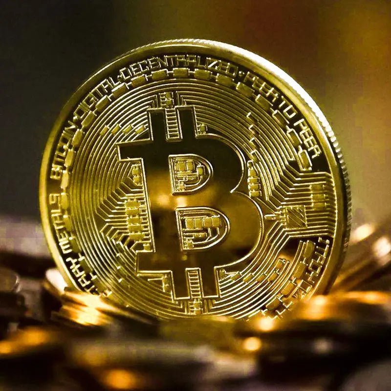 Gold plated Bitcoin coin collectible from MANDOTOS INTERNATIONAL, featuring antique-style design and physical Casascius Bitcoin art.