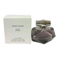 Gucci Bamboo Eau De Parfum 2.5oz tester bottle with clear packaging and spray nozzle, displayed on a plain background.