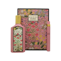 Gucci Flora Gardenia Duo EDP set with two floral perfume bottles, elegant packaging, and botanical design.