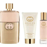 Gucci Guilty 3-piece gift set for women including 3 oz Eau de Parfum spray, body lotion, and travel spray in a hardbox packaging.