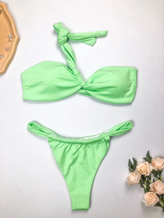 Mandotos International eco-friendly women's one-shoulder bikini set with split design, made from recycled fabric, suitable for stylish swimwear.