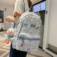 Mandotos International high capacity plaid student backpack with cute print, ideal for school and everyday use