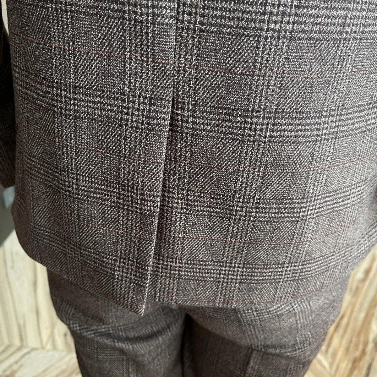 High-quality British Korean style plaid men's 3-piece business casual suit set by MANDOTOS INTERNATIONAL, featuring a blazer, vest, and trousers.