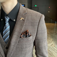 British Korean style plaid men's 3-piece business casual suit set by MANDOTOS INTERNATIONAL, featuring a jacket, vest, and trousers.