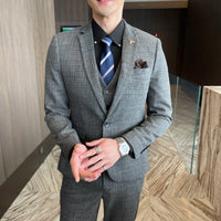 British Korean style plaid men's 3-piece business casual suit set by MANDOTOS INTERNATIONAL, featuring a jacket, vest, and trousers.