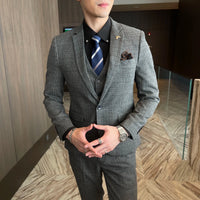 High-quality British Korean style plaid men's 3-piece business casual suit set by MANDOTOS INTERNATIONAL, featuring a jacket, vest, and trousers.