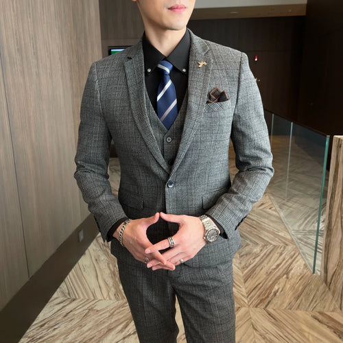High-quality British Korean style plaid men's 3-piece business casual suit set by MANDOTOS INTERNATIONAL, featuring a jacket, vest, and trousers.