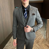 British Korean style plaid men's 3-piece business casual suit set by MANDOTOS INTERNATIONAL, featuring tailored jacket, vest, and trousers.
