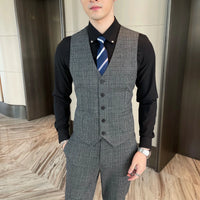 British Korean style plaid men's 3-piece business casual suit set by MANDOTOS INTERNATIONAL, featuring a tailored blazer, vest, and trousers.