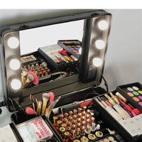 Mandotos International high-quality makeup travel rolling carry case with built-in lights, cosmetic trolley suitcase for beauty essentials.