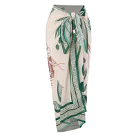 Mandotos International women’s print sarong and bikini set with beach coverup wrap and pareo, high-quality swimwear fabric, 2-piece design.