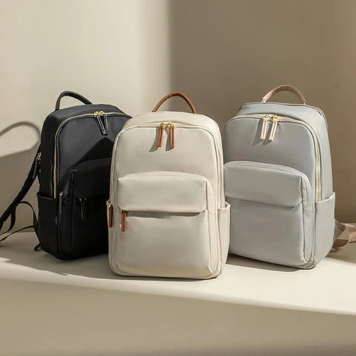 High-quality waterproof laptop backpack by MANDOTOS INTERNATIONAL, designed for business travel with multiple compartments.