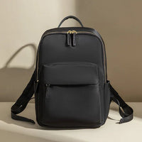 Mandotos International waterproof laptop backpack designed for business travel, with multiple compartments and adjustable straps.