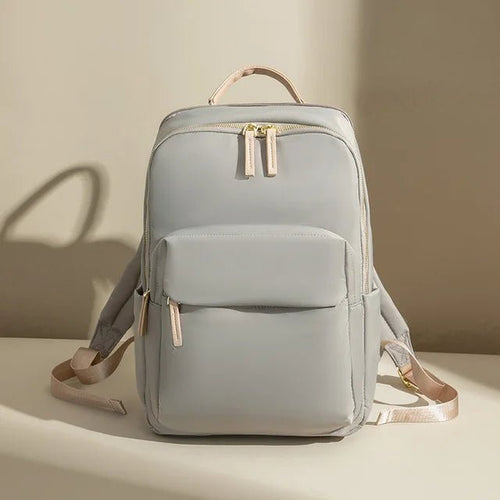 Mandotos International waterproof laptop backpack designed for business travel, featuring multiple compartments and durable material.