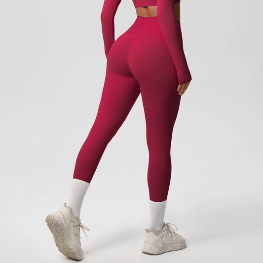 High waist women's yoga leggings by Mandotos International with pockets, stretch fabric, push-up design, ideal for fitness and running.