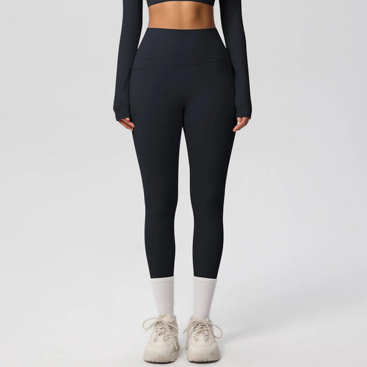 High waist women's Mandotos International yoga leggings with stretch fabric, pockets, and push-up design for fitness and running activities.