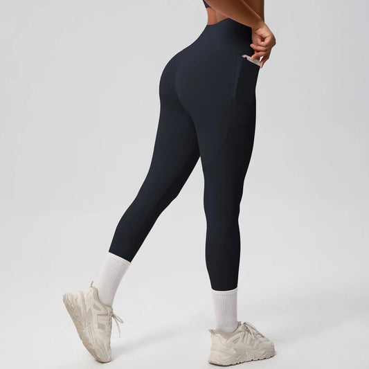 High waist women's stretch yoga leggings with pockets, push-up fit, solid color, ideal for fitness, running, and sportswear by Mandotos International.