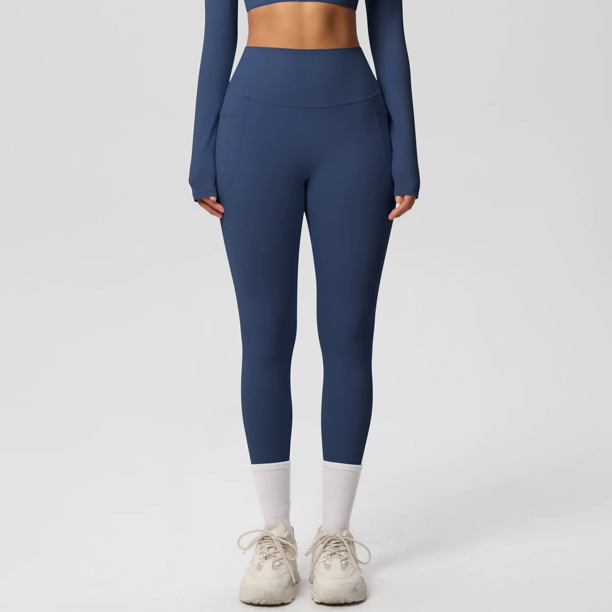 High waist women's Mandotos International stretch yoga leggings with pockets, push-up design, perfect for running and fitness.