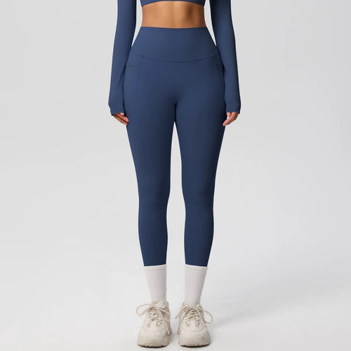 High waist women's Mandotos International stretch yoga leggings with pockets, push-up design, perfect for running and fitness.