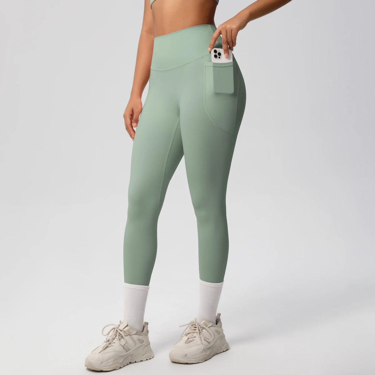 Mandotos high waist women's stretch yoga leggings with pockets, push-up fit, solid color, ideal for fitness, running, and sports.