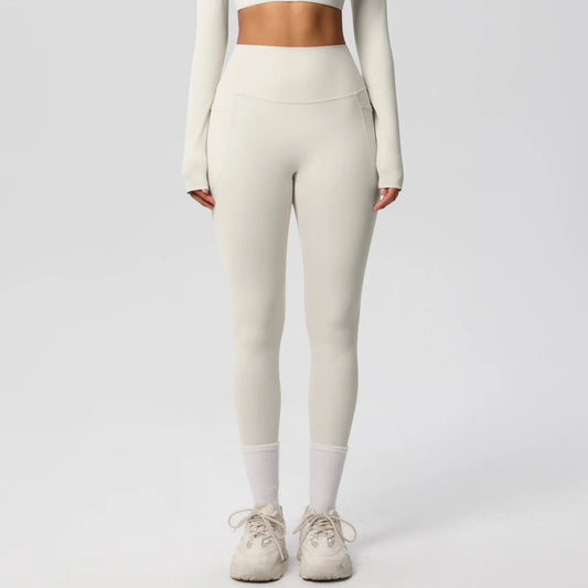 High waist women's Mandotos leggings with stretch fabric, pockets, and push-up design for yoga, running, and fitness activities.