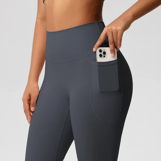 Mandotos high waist women's yoga leggings with pockets, stretch fitness pants, push-up style, solid color for running and sports.