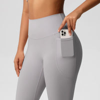 Mandotos International high waist women's stretch yoga leggings with pockets, push-up design, ideal for fitness and running.