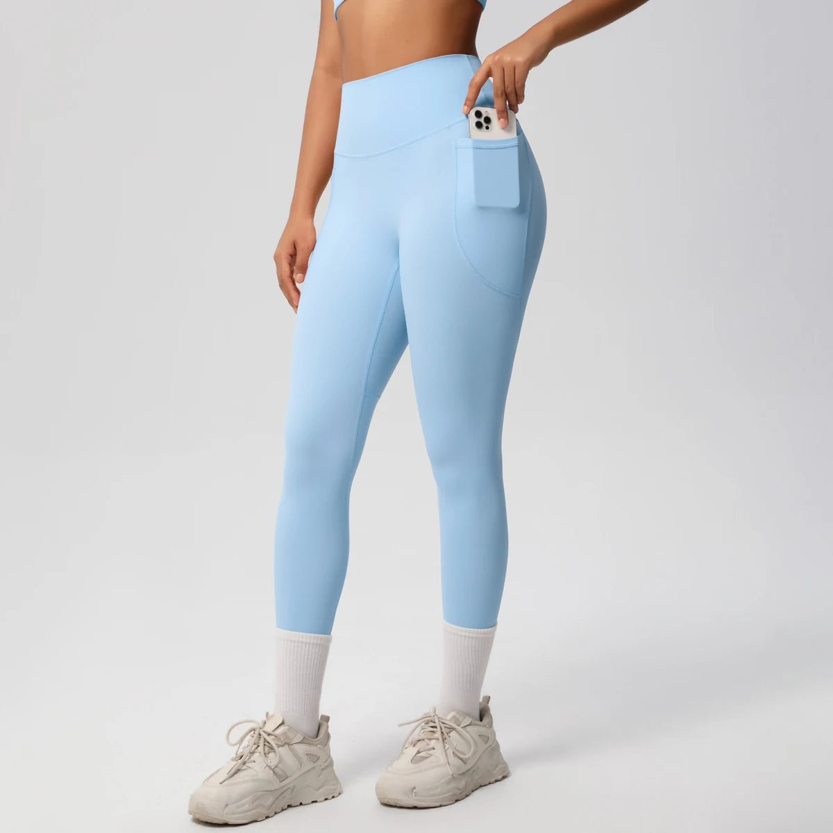 Mandotos high waist women's stretch yoga leggings with pockets, push-up fit, ideal for fitness, running, and sports in solid color.