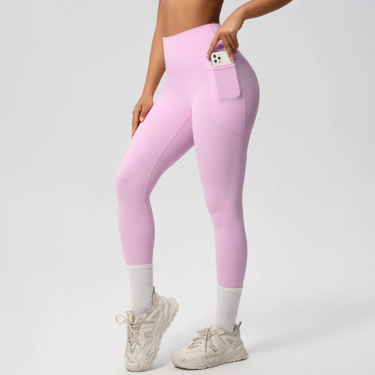 High waist women's Mandotos International yoga leggings with stretch fabric, pockets, and a push-up fit for fitness and running.