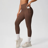 Mandotos International high waist women's stretch yoga leggings with pockets, push-up design, ideal for fitness and running.