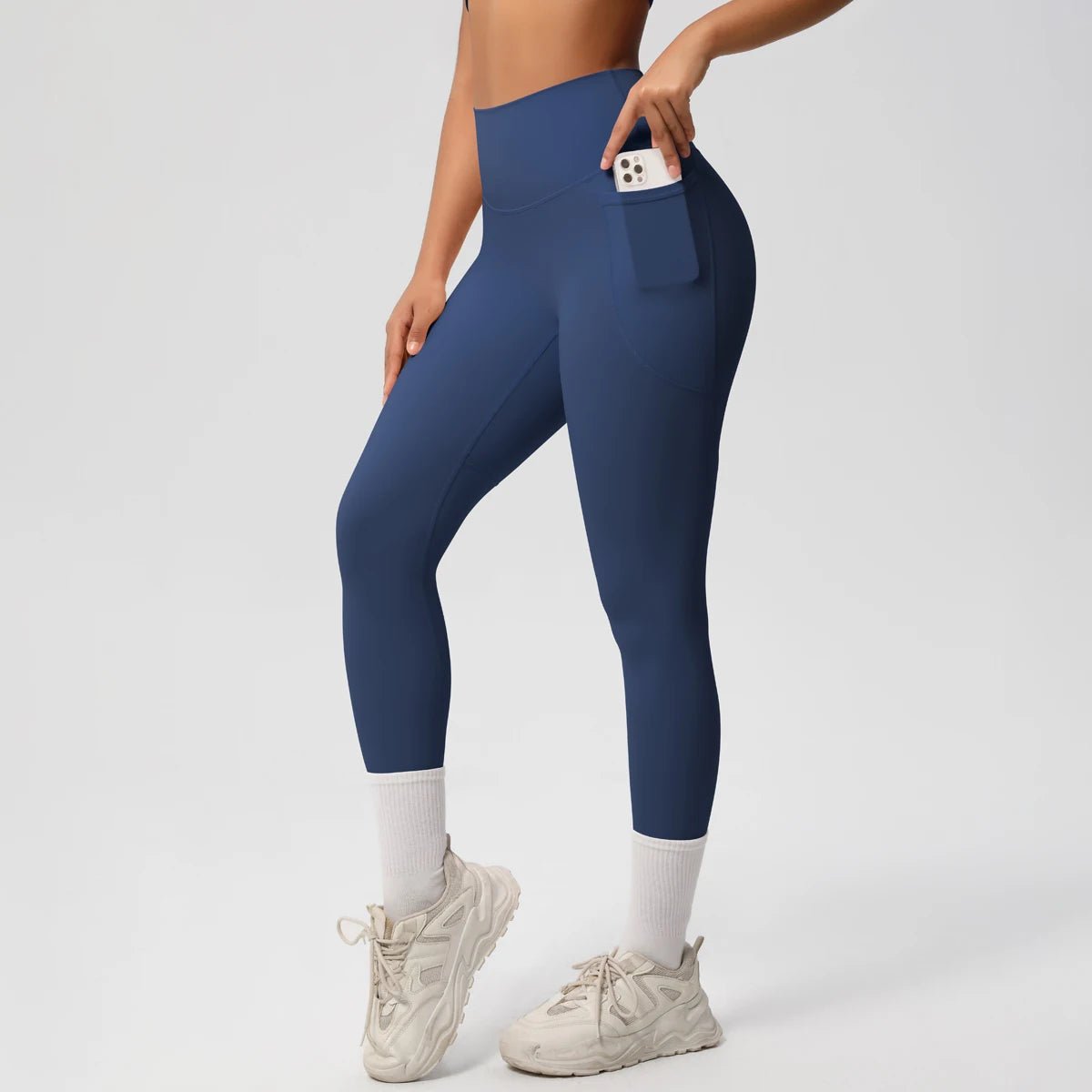 Mandotos International high waist women's stretch yoga leggings with pockets, push-up design, ideal for fitness and running.
