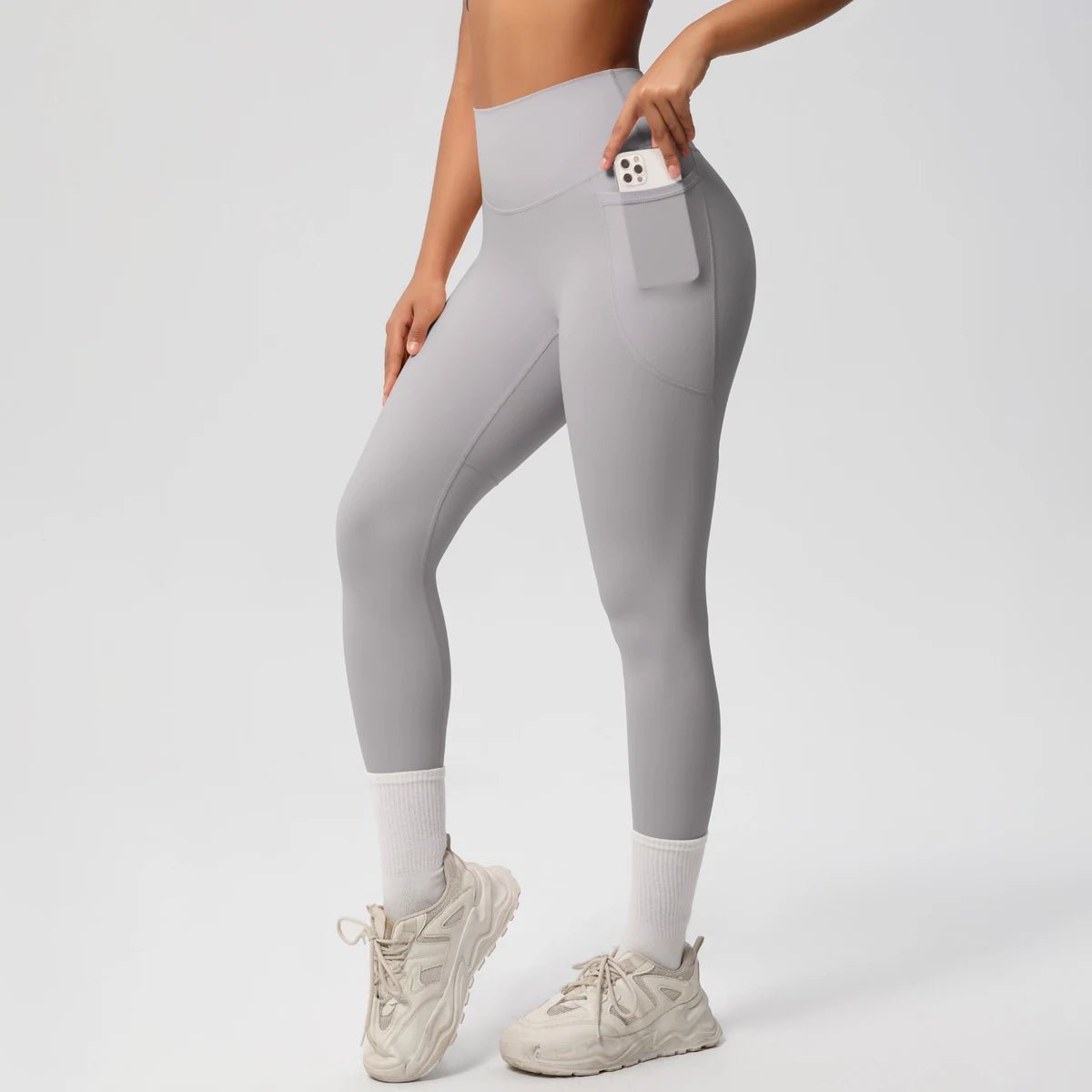 Mandotos high waist women's stretch yoga leggings with pockets, push-up fit, suitable for fitness, running, and sports in solid color.