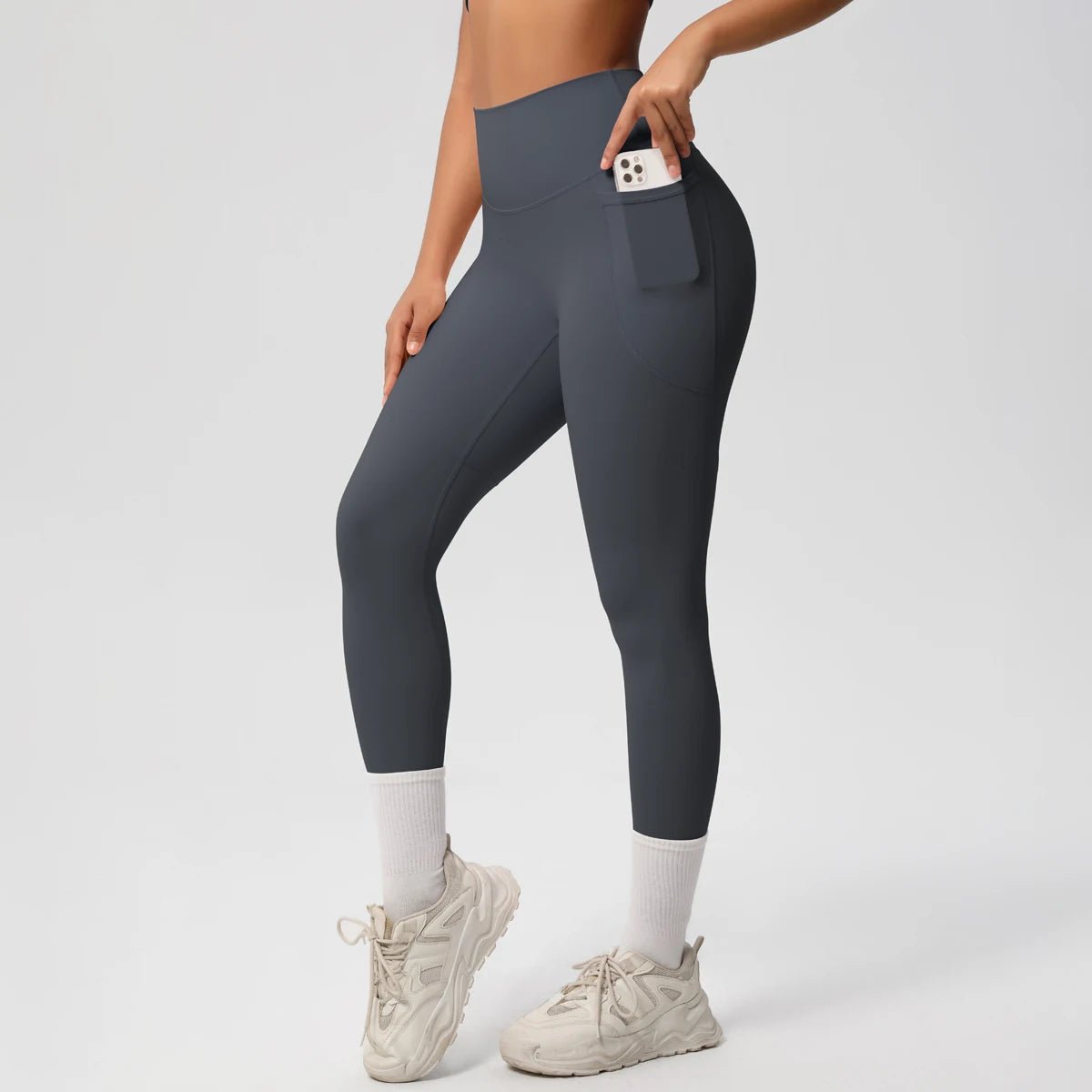 Mandotos International high waist women's stretch yoga leggings with pockets, push-up fit, ideal for fitness and running, solid color