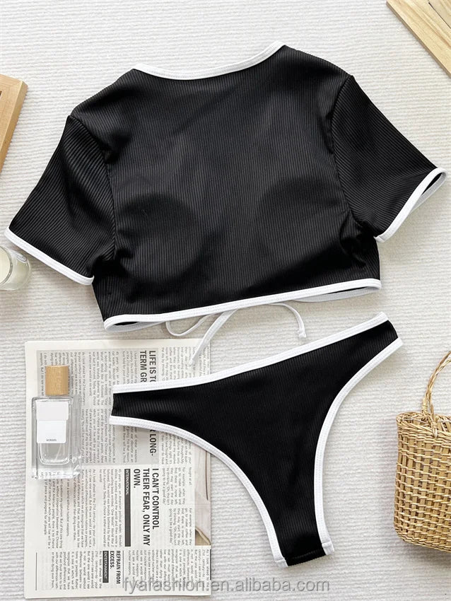 Mandotos International hot micro girl two-piece racing bikini crop top and swimwear with short sleeves.