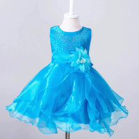 Kids glam dresses and gowns by MANDOTOS INTERNATIONAL featuring sparkly fabrics and stylish designs for special occasions.