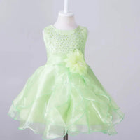 Kids glam dresses and gowns by MANDOTOS INTERNATIONAL, featuring colorful, stylish party dresses for children.