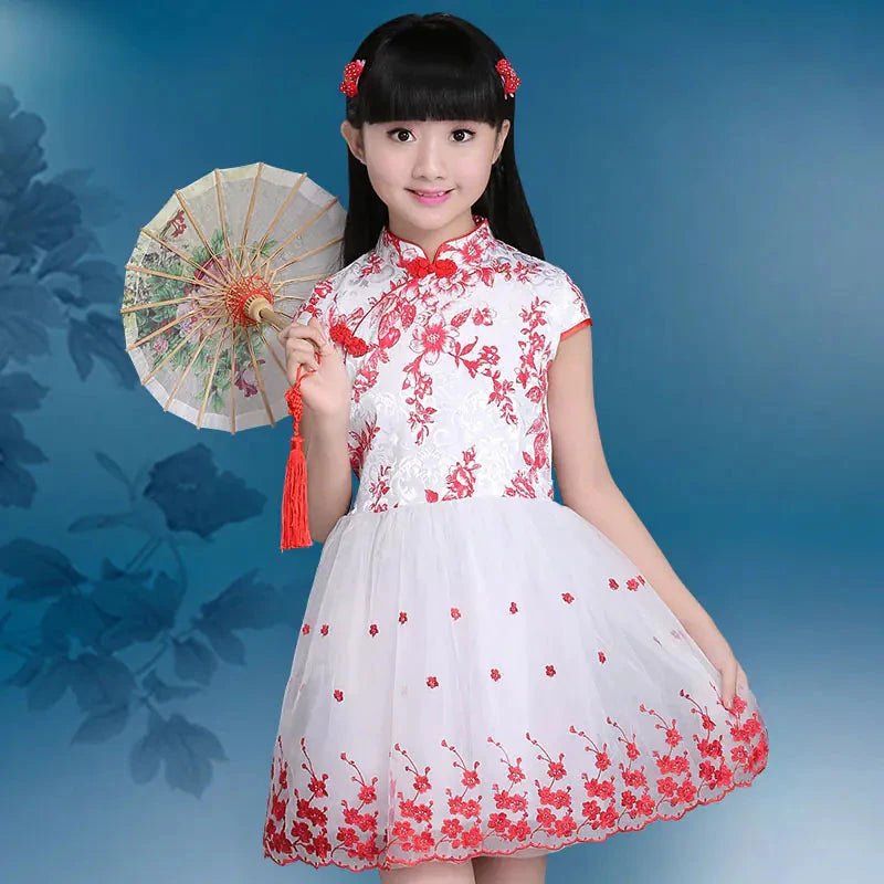Colorful kids' summer dress from MANDOTOS INTERNATIONAL, featuring playful patterns and lightweight fabric for warm weather.