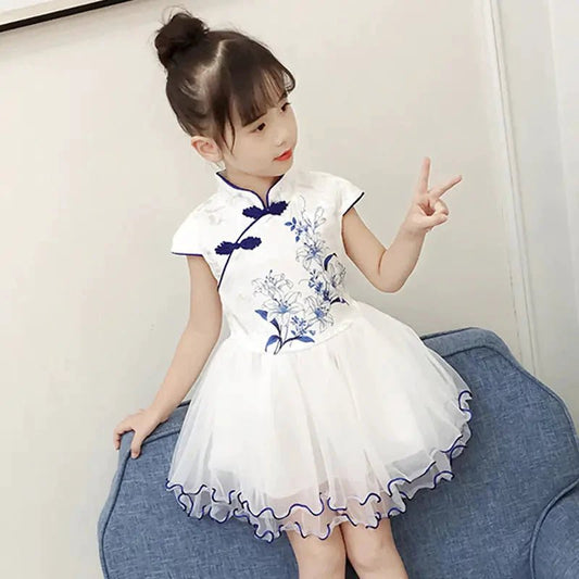 Colorful kids' summer dresses from MANDOTOS INTERNATIONAL, featuring lightweight fabrics and playful patterns.
