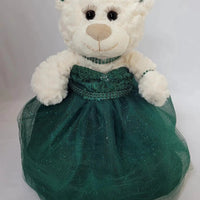 Emerald green 12-inch Quince Anos doll with dress and teddy bear centerpiece from KINNEX COLLECTIONS SINCE 1997 by MANDOTOS INTERNATIONAL.