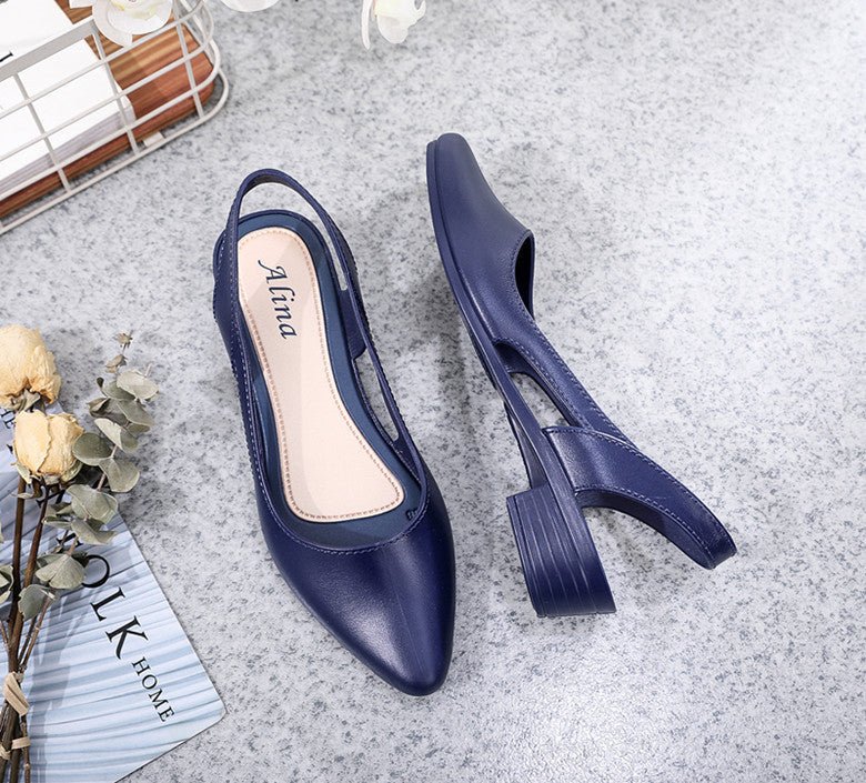 Korean style mid-low heel jelly sandals for women by MANDOTOS INTERNATIONAL, transparent and colorful with a sleek design.
