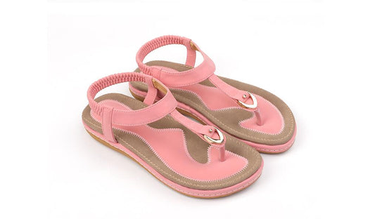 Ladies' chic beach flip flops by MANDOTOS INTERNATIONAL with stylish straps, perfect for summer casual wear.