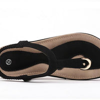 Ladies' chic beach flip flops by MANDOTOS INTERNATIONAL featuring stylish straps and comfortable soles for warm weather.
